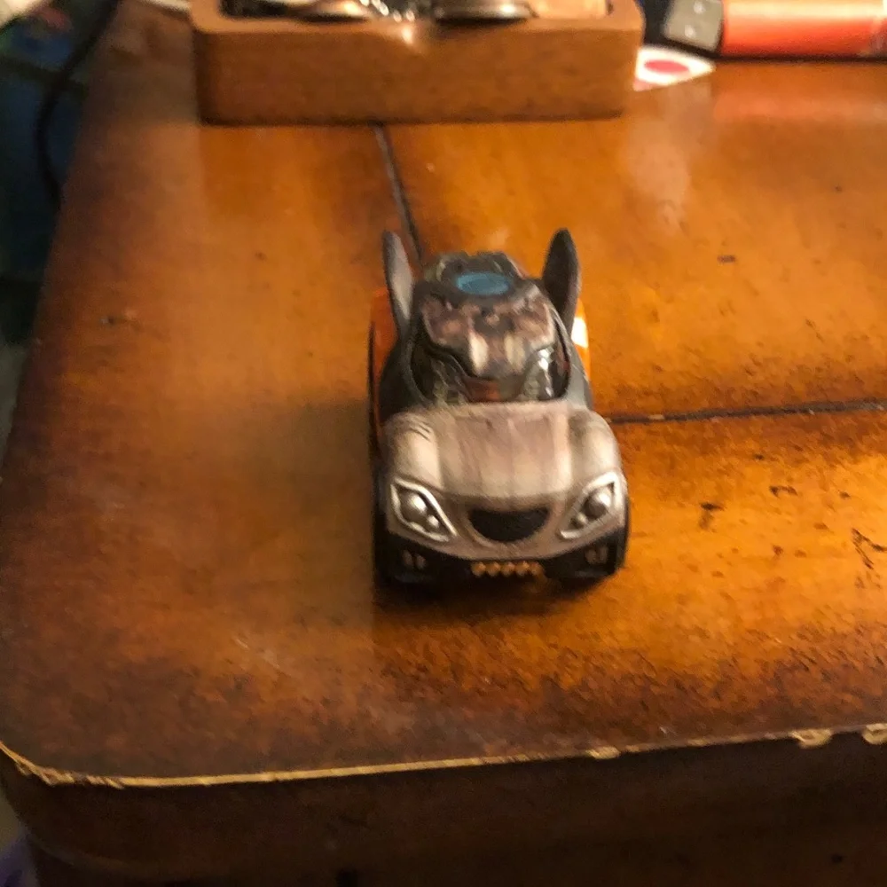 Die-Cast Toy Car in Metallic Brown with Orange Accents